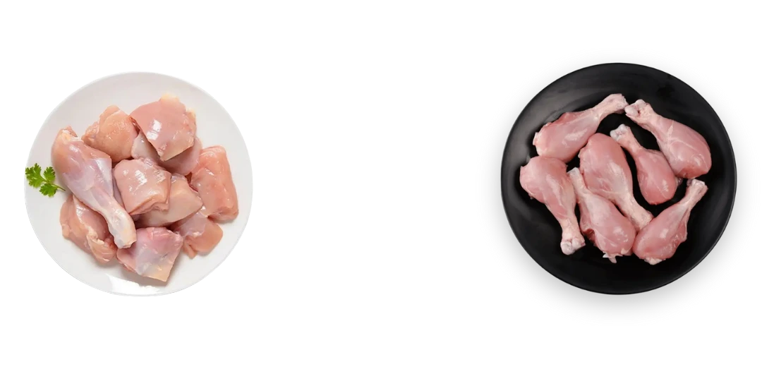 Fresh Chicken Meat Category Top view of fresh raw chicken curry cut pieces on a white plate. Buy premium halal chicken online in Seohara.